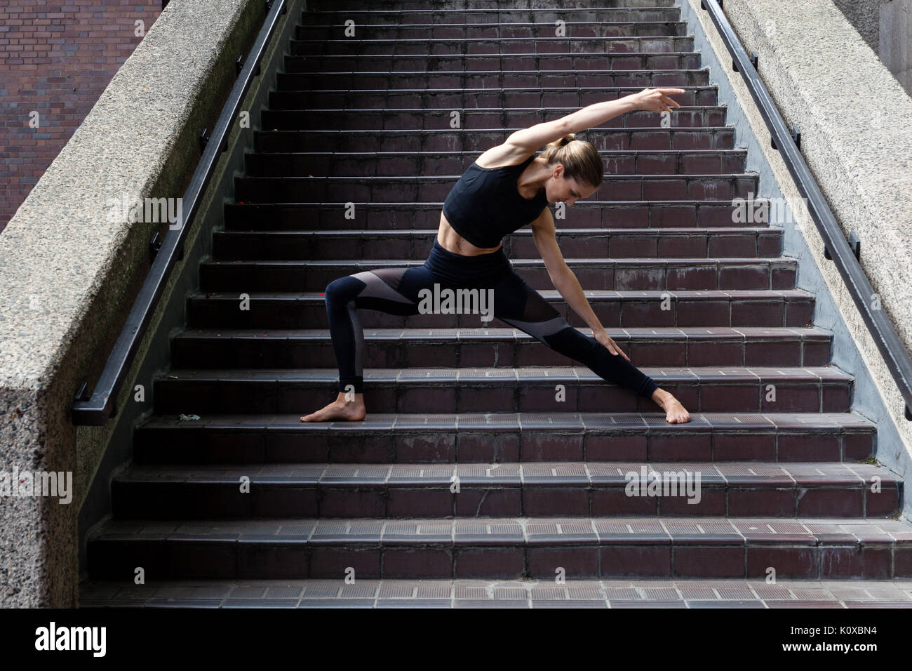 Yoga in the city of London - finding inner quiet amidst the busyness of the City Stock Photo