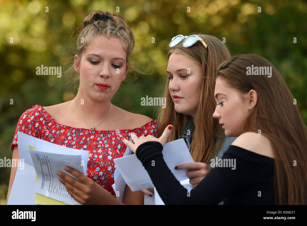 (left to right) Ella Todd, Sophie Gant and Molly Riordan collect their GCSE results at Norwich School. Stock Photo