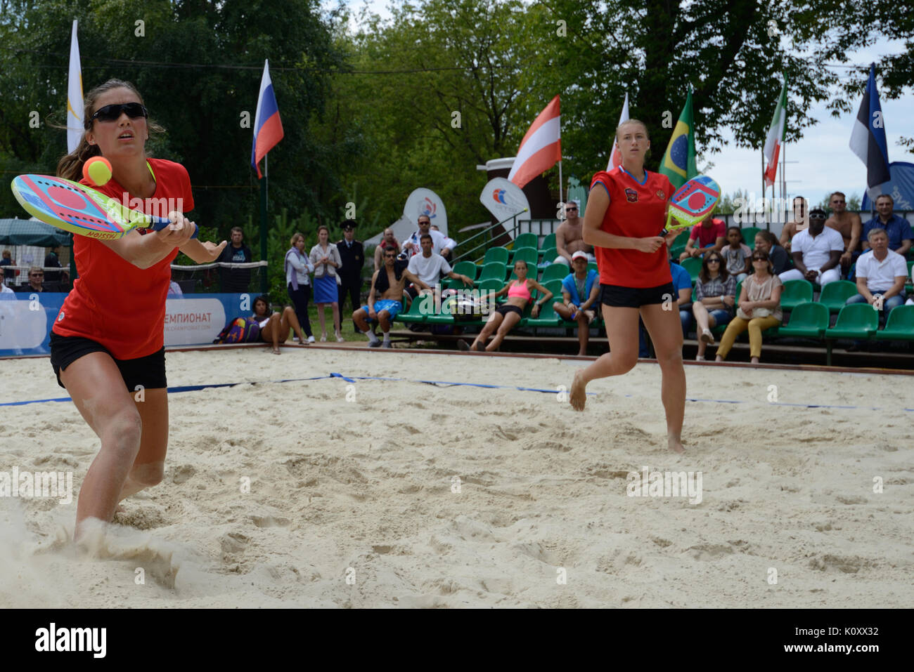 Moscow, Russia - July 18, 2015: Irina Glimakova (right) and Julia Chubarova of Russia in the semifinal match of the Beach Tennis World Team Championsh Stock Photo
