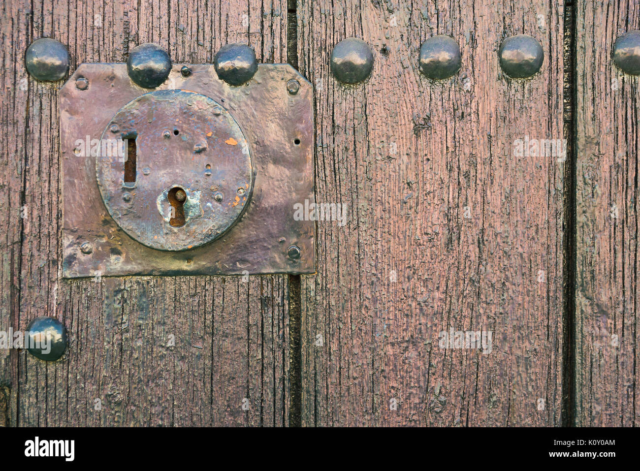 Old door with keyhole. Rustic door for texture or background Stock Photo