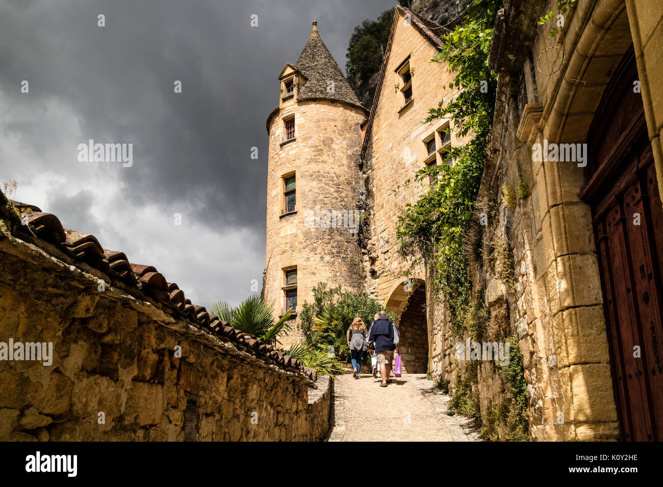 The 15th Century Renaissance Style Manoir de Tarde in the Village of La Roque-Gageac, Set Against a Dramatic Stormy Sky, Dordogne, France, Europe Stock Photo