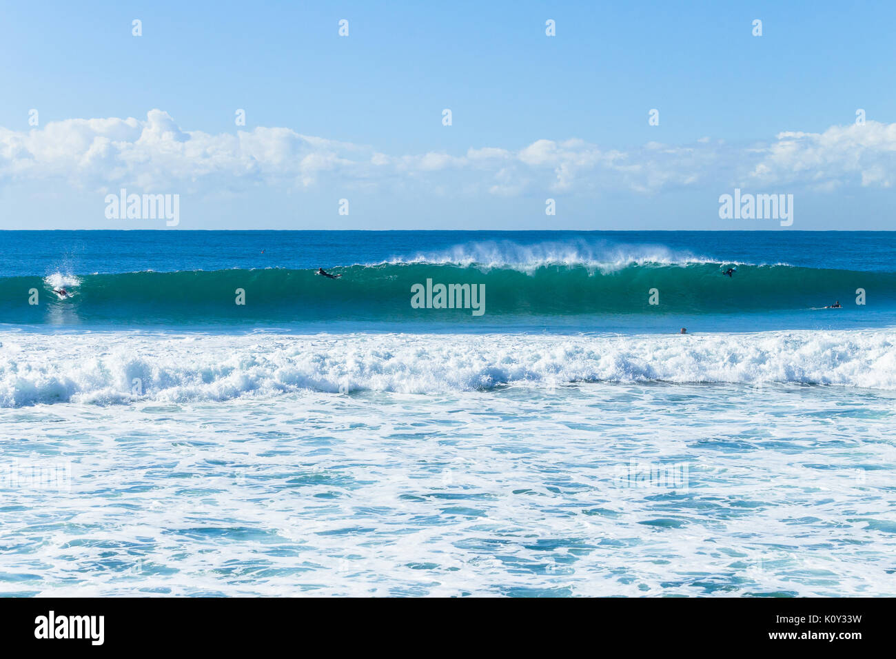Silhouetted surfers hi-res stock photography and images - Alamy