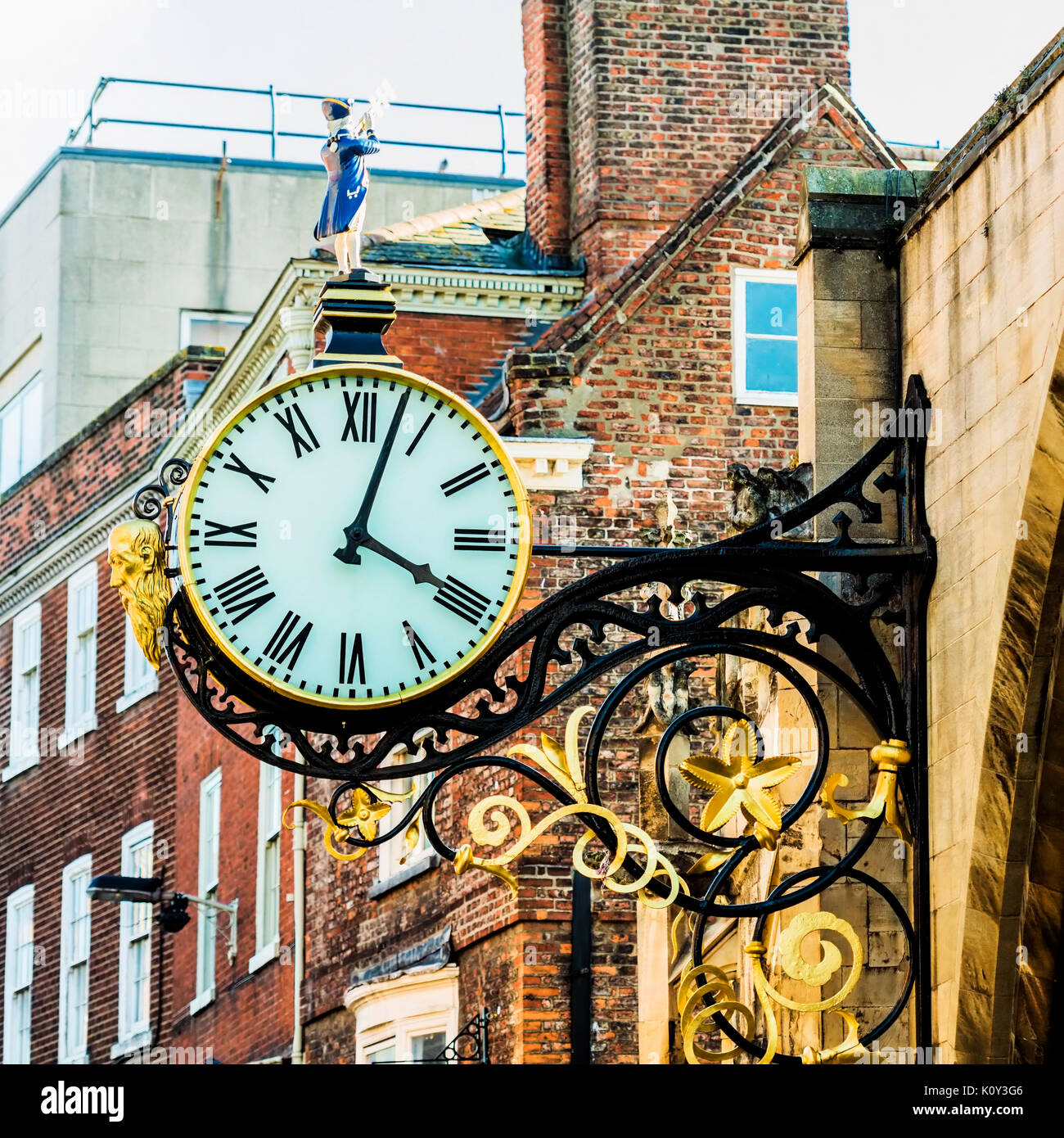 St Martin's Clock in Coney Street in York. The clock was designed in the 1950s and has been damaged several times including during WW2. Stock Photo