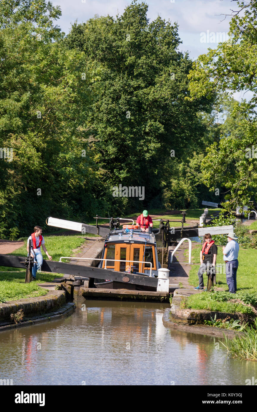 Boating on the Worcester and Birmingham canal near Tardebigge, Worcestershire, England, UK Stock Photo
