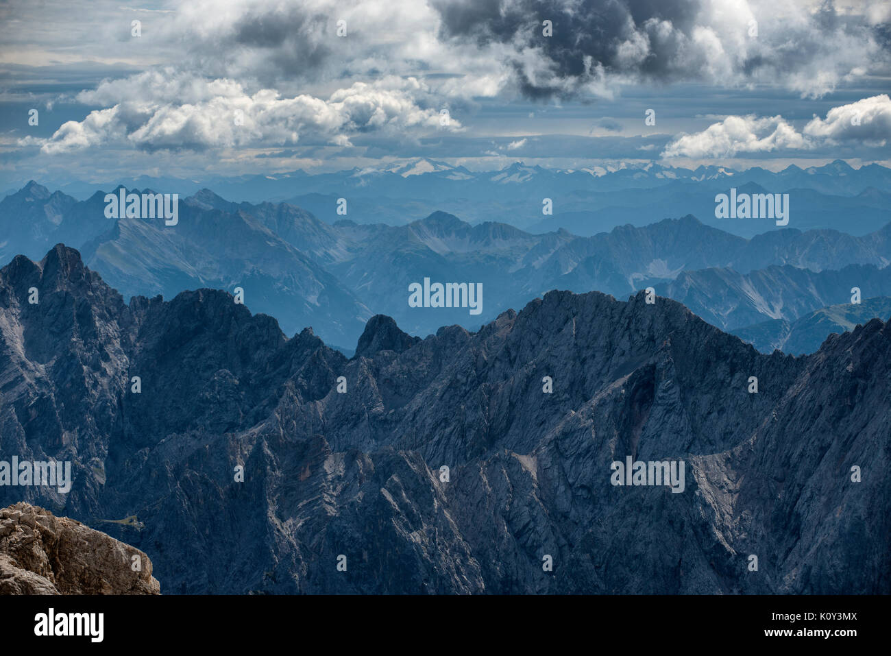 The view from the top of the Zugspitze mountain on the Austria Germany border. Stock Photo