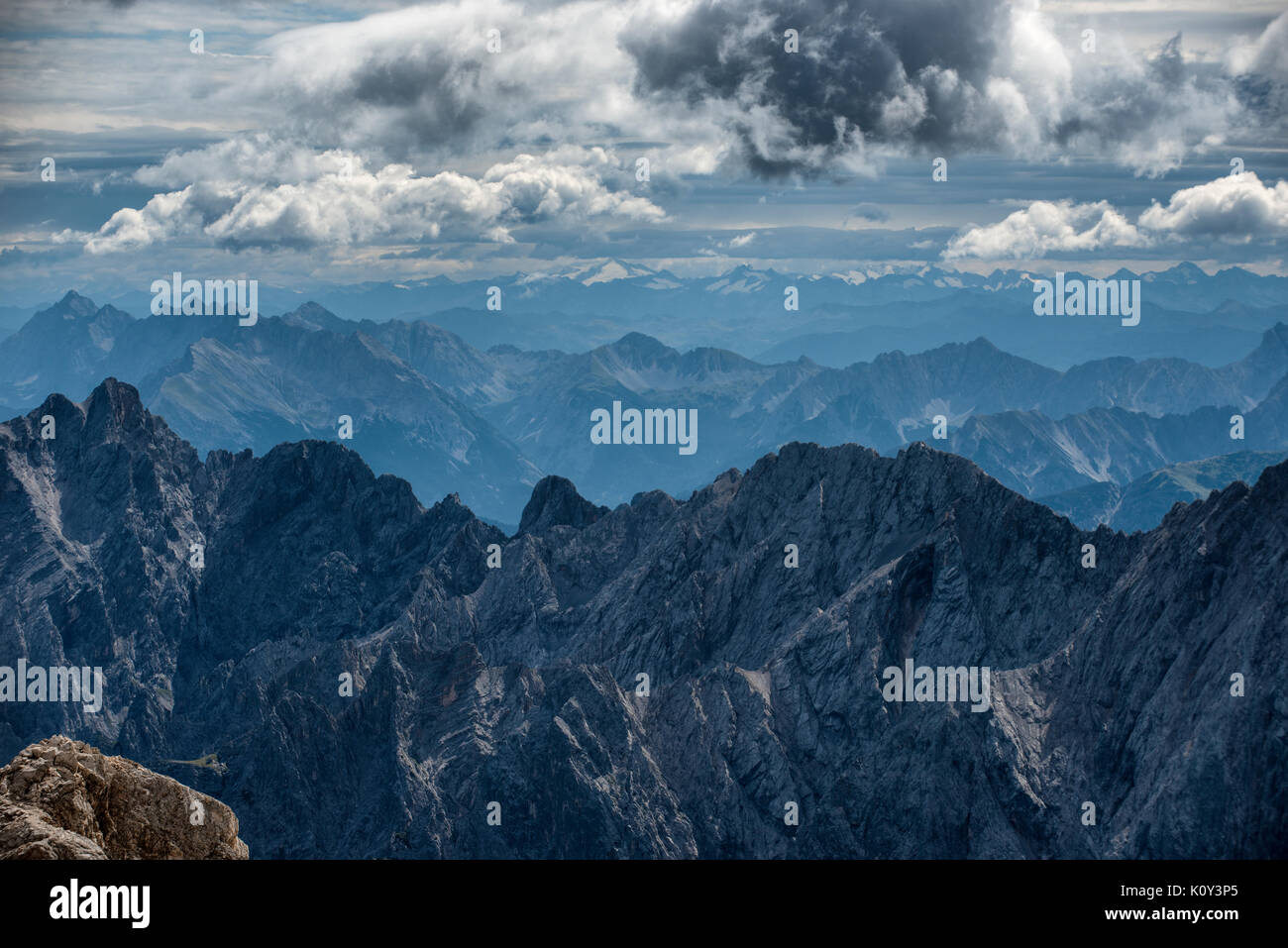 The view from the top of the Zugspitze mountain on the Austria Germany border. Stock Photo