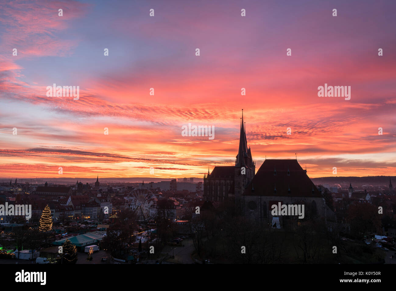 Christmas market and cathedral & St. Severi at sunrise, Erfurt, Germany Stock Photo