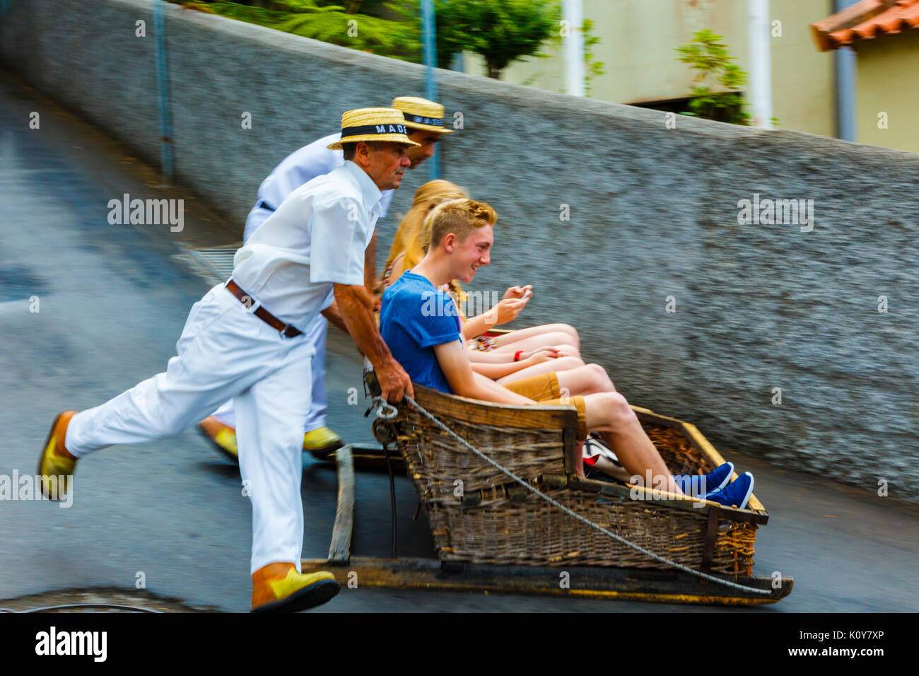 Toboggan ride going down in Monte Stock Photo Alamy