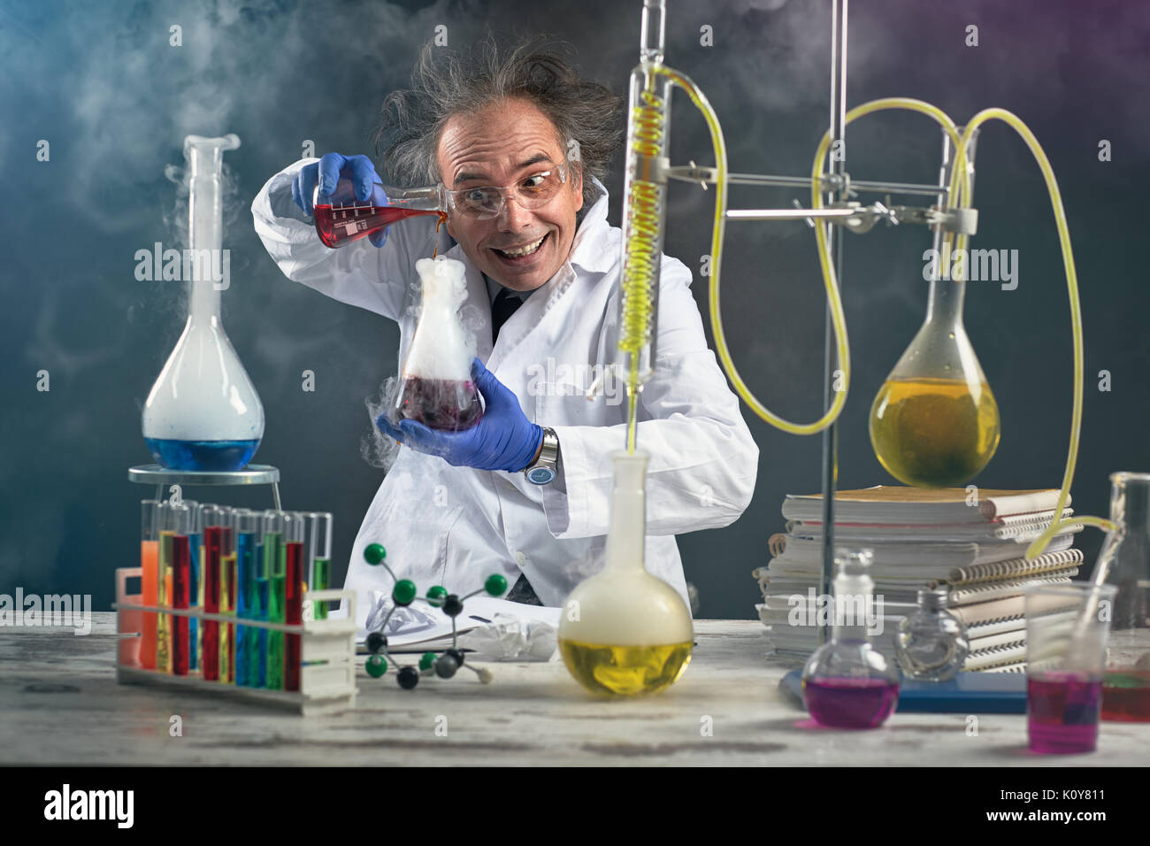 crazy-chemist-doing-experiment-chemical-laboratory-K0Y811.jpg