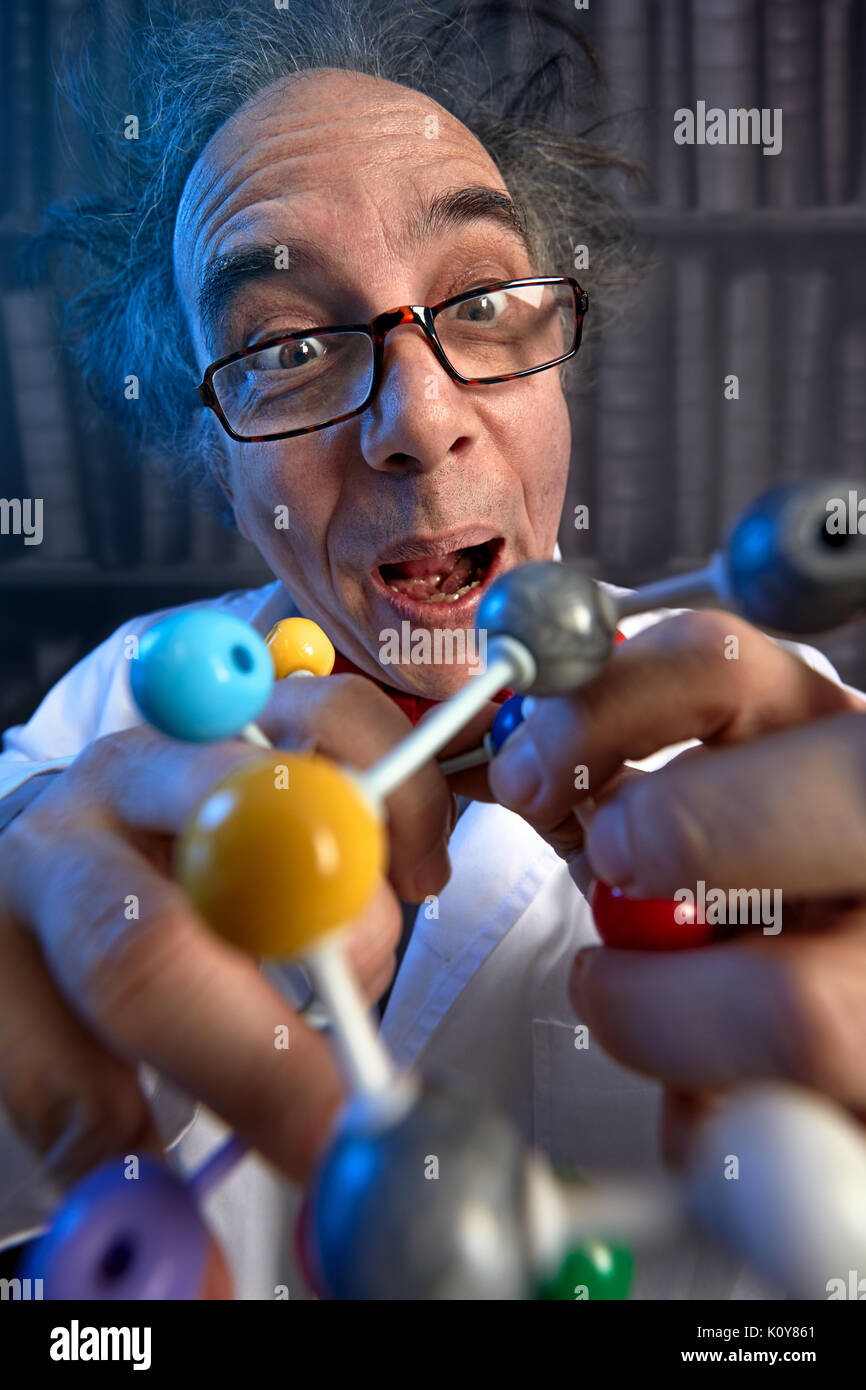 happy scientist astonishment looking  structure of model molecules Stock Photo