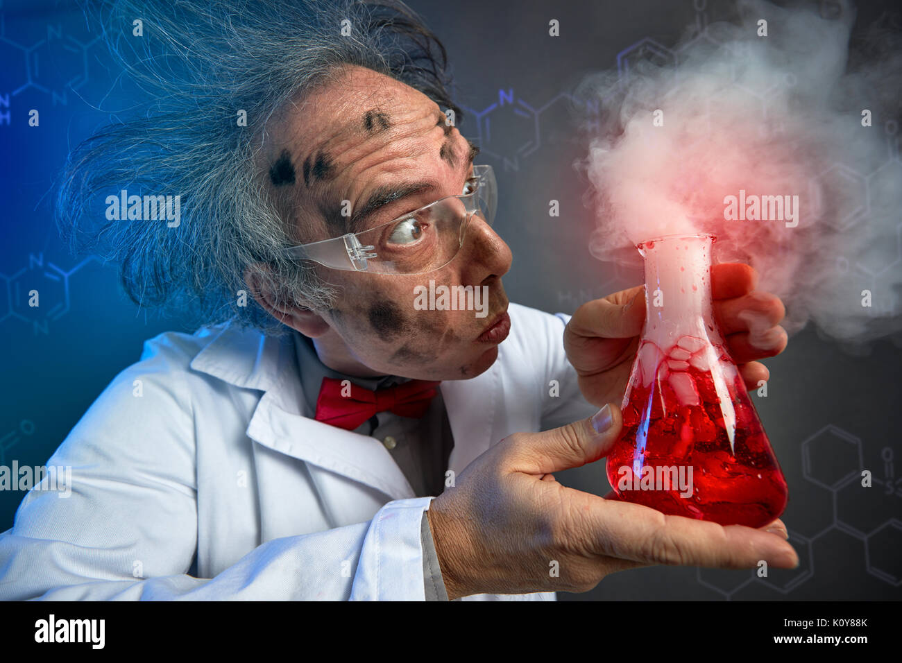scientist looking in astonishment why the experiment exploded Stock Photo