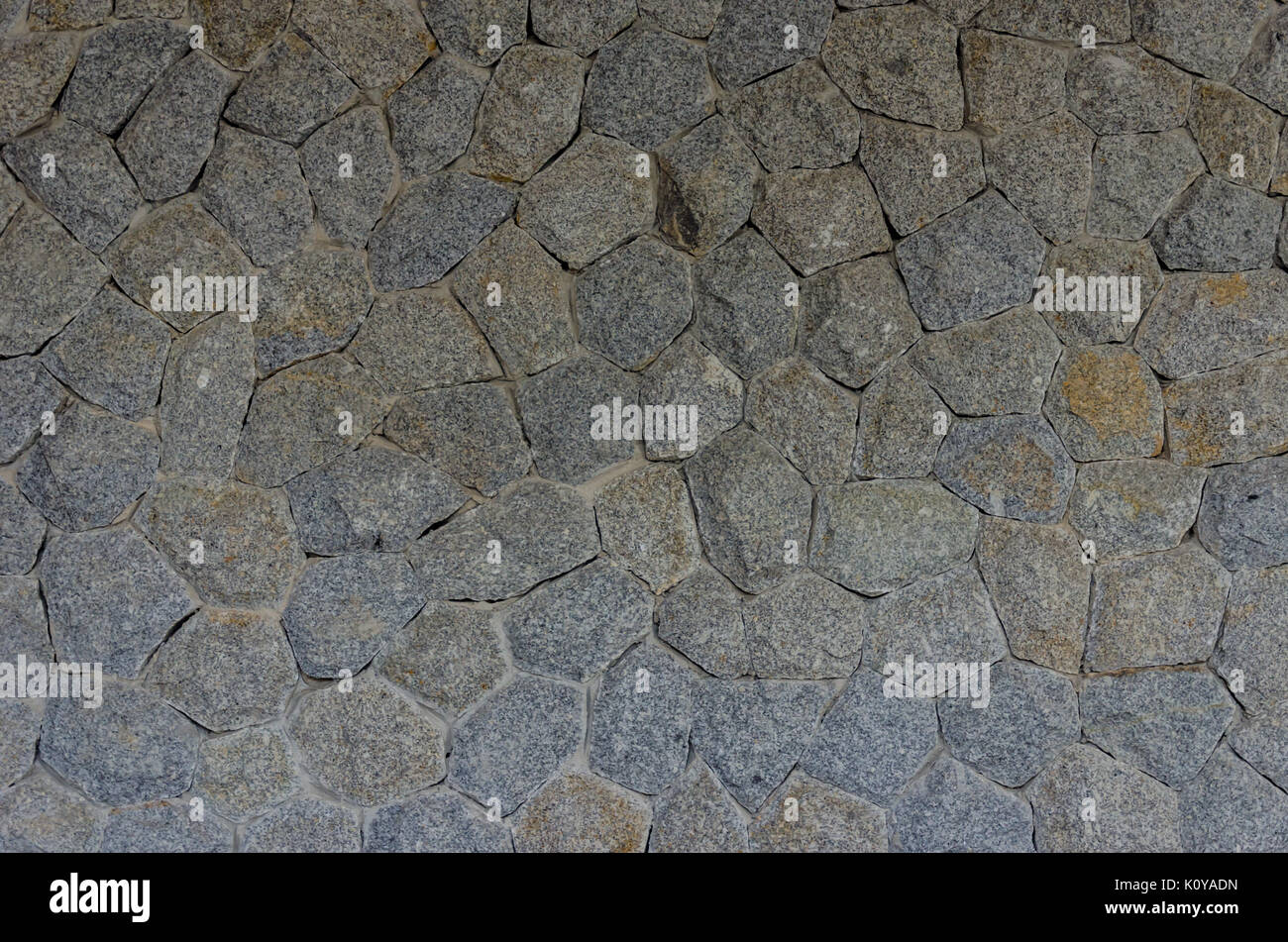 Rustic stone wall background Stock Photo - Alamy