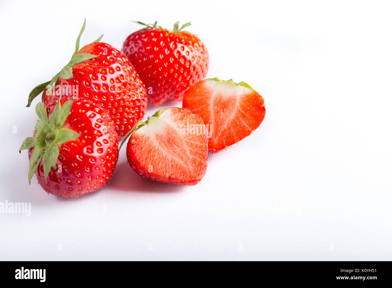 multiple strawberry's on a white background Stock Photo