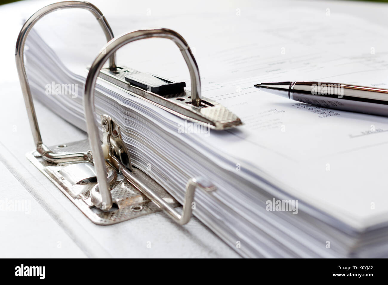 Pen on file folder with documents, storage of contracts. selective focus. Stock Photo