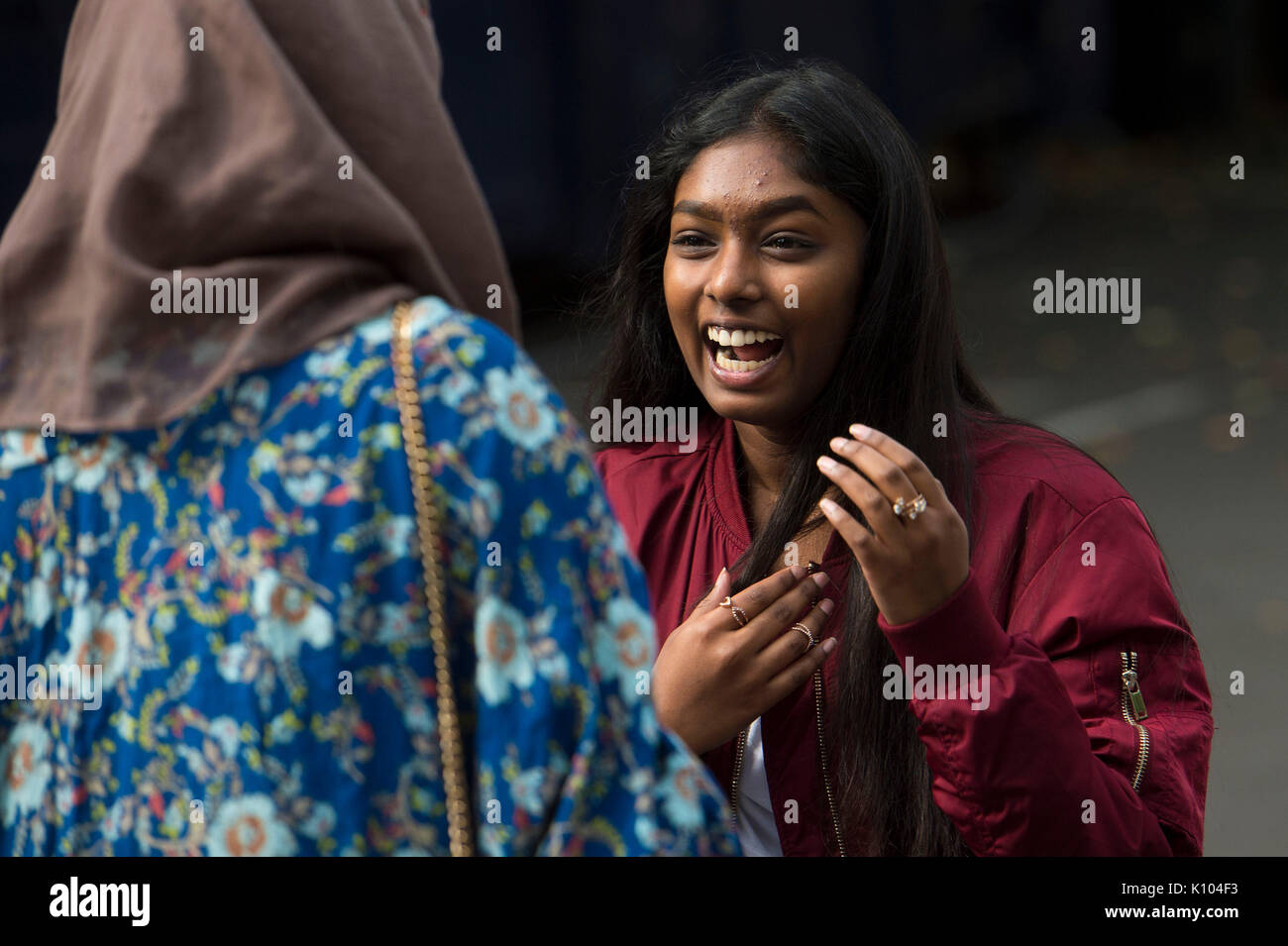 Students celebrate after collecting their GCSE results, at Sion-Manning Roman Catholic Girls school in west London. Stock Photo