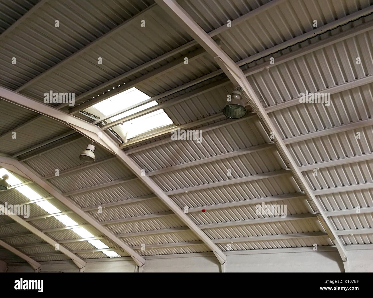 Roof with skylights in industrial building Stock Photo - Alamy