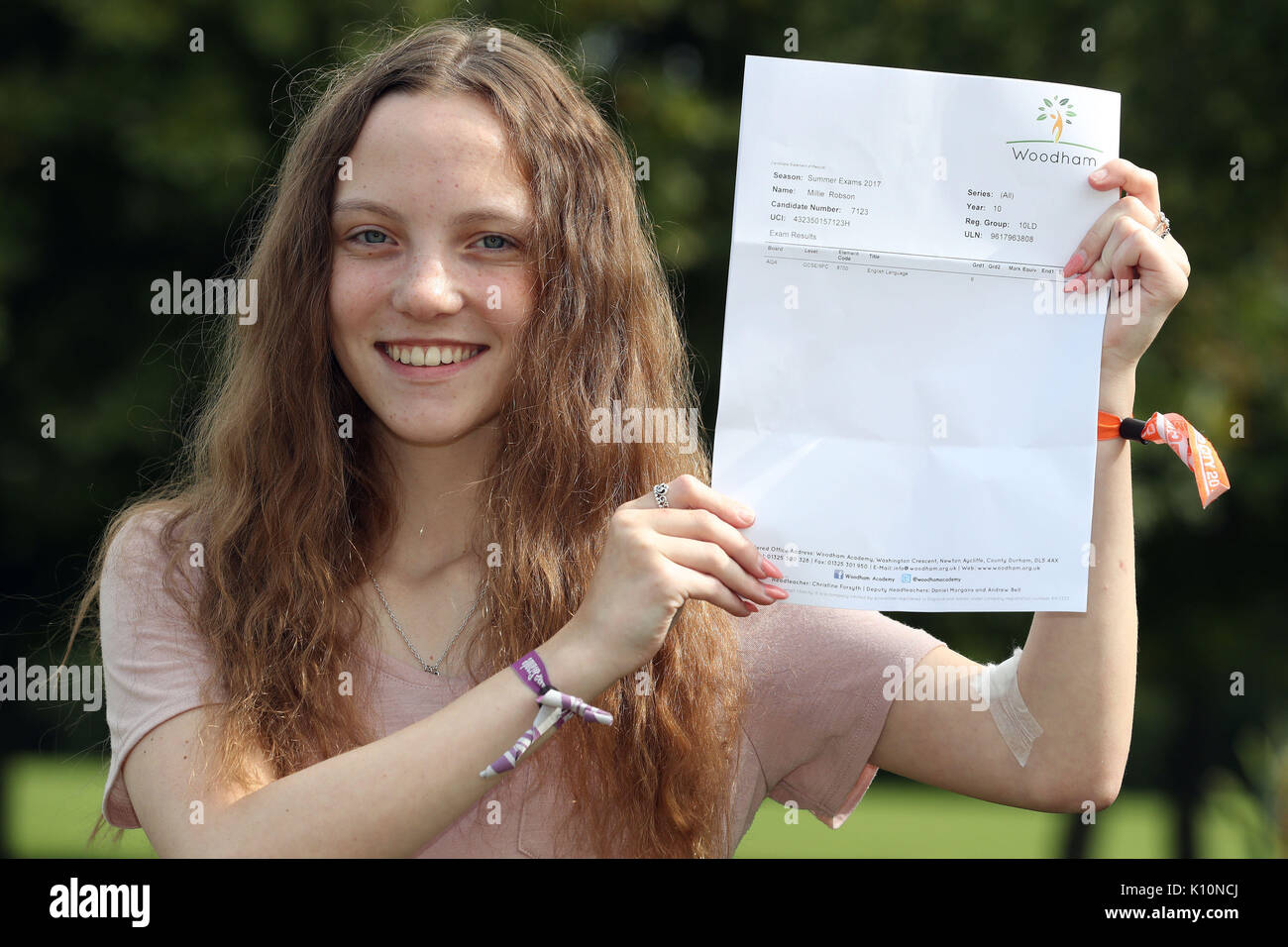 Millie Robson, 15, who was injured in the Manchester Bombings celebrates taking her GCSE English a year early, at Woodham Academy in Newton Ayrcliffe. Stock Photo