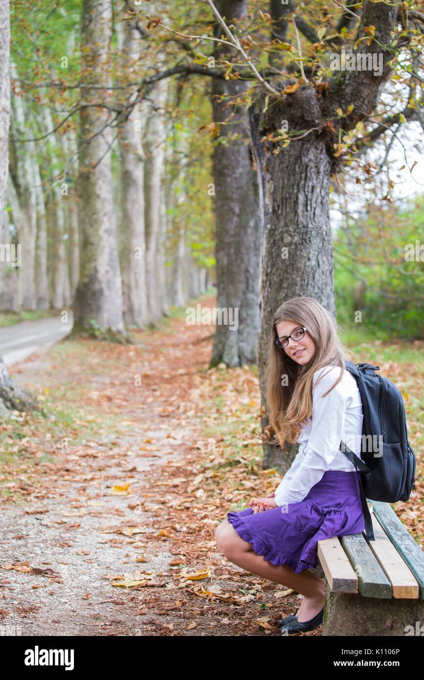 School Girl Sitting On Bench High Resolution Stock Photography and ...