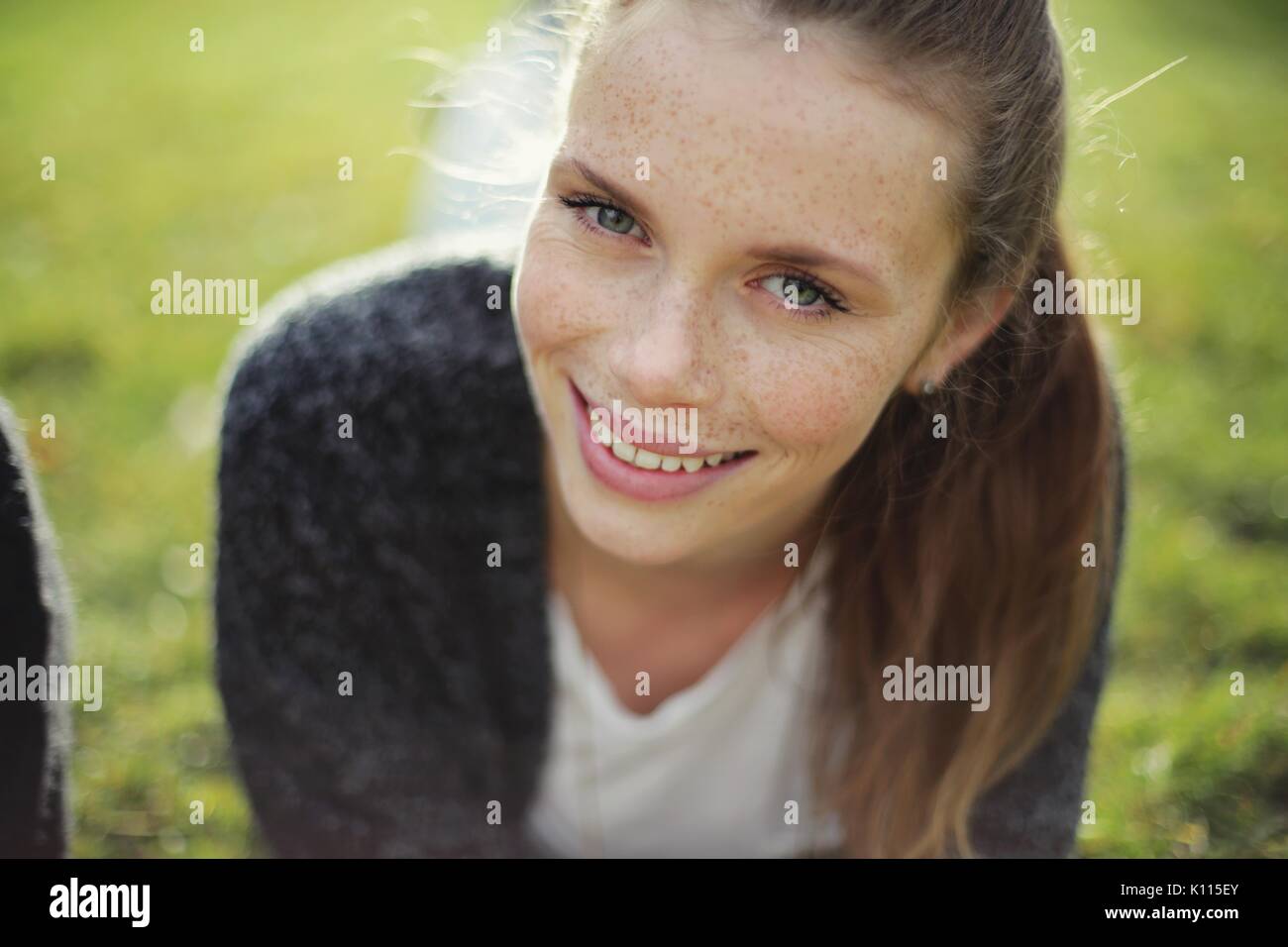 Portrait of a young woman with freckles Stock Photo