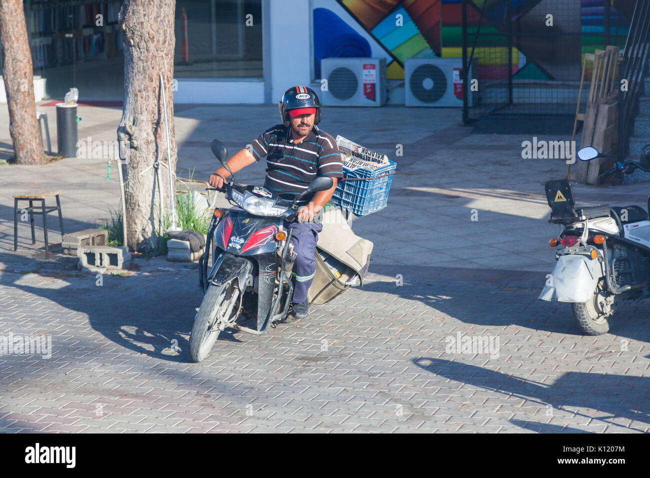 Postman on motorcycle hi-res stock photography and images - Alamy