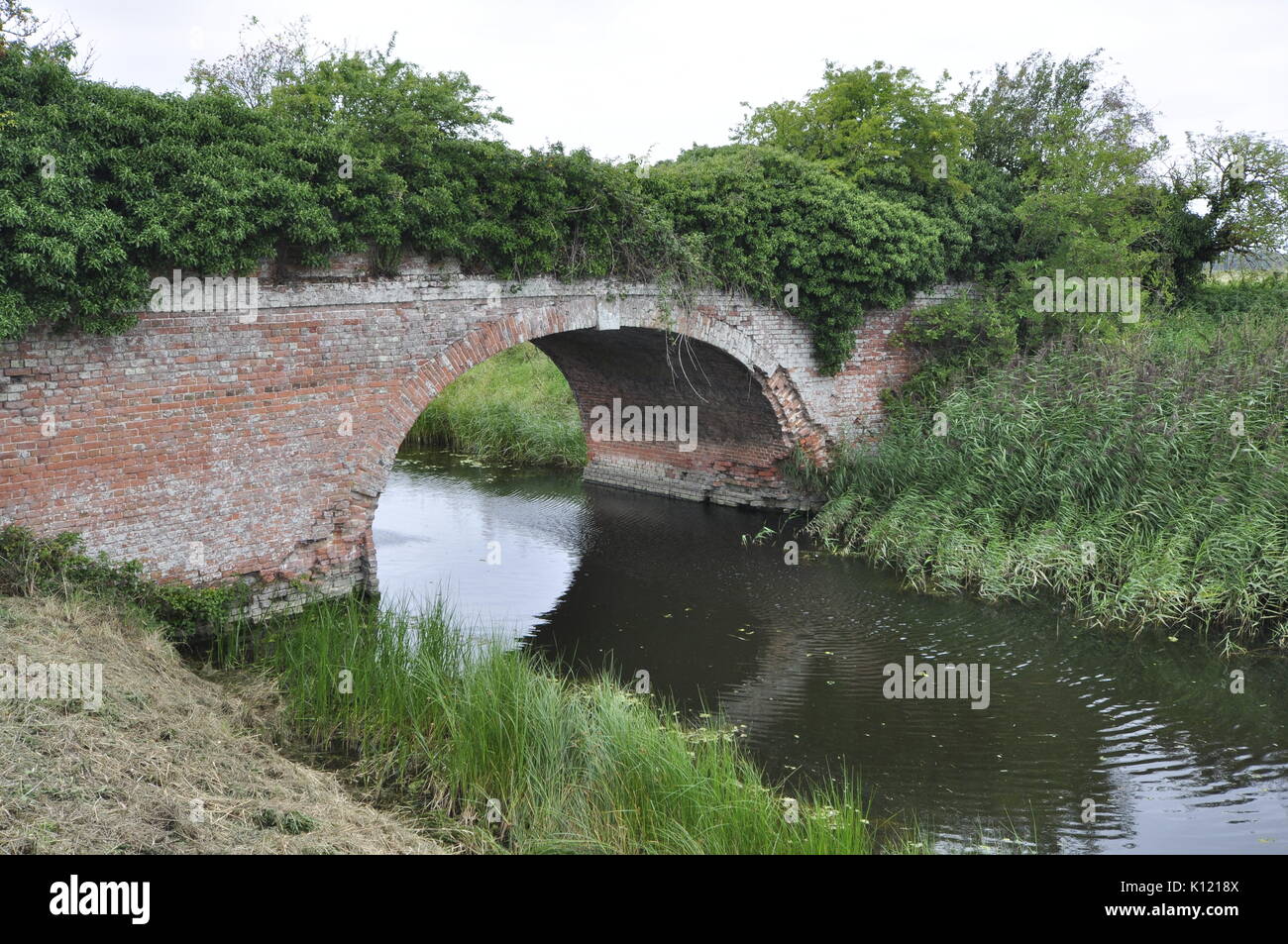 bridge on Mill Basin drain at OS grid 582146 Norfolk Fens England UK Stock Photo