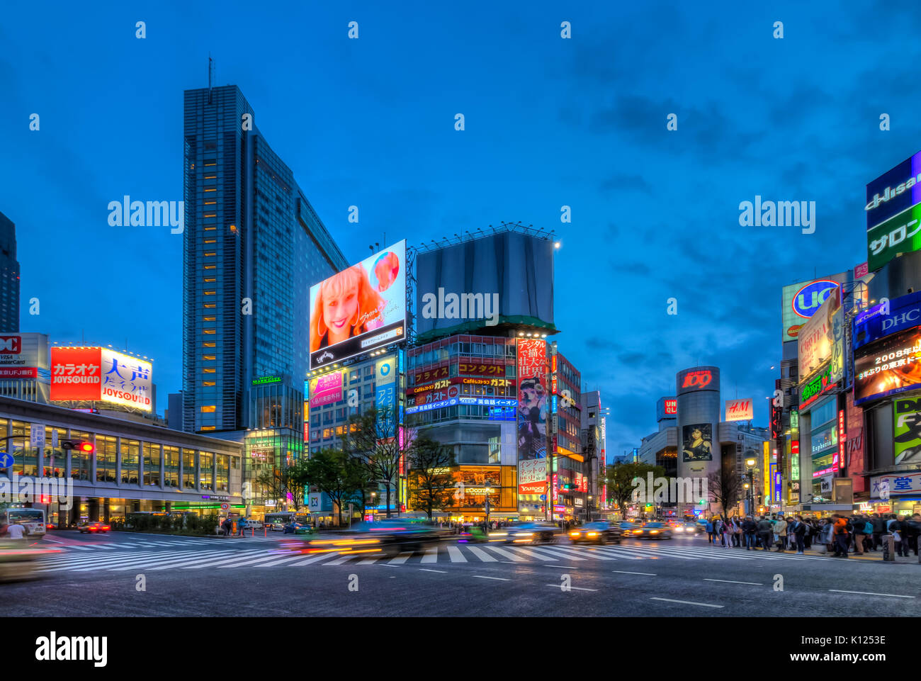 Shibuya crossing at night in the Shibuya district of Tokyo, Japan, Asia. Stock Photo