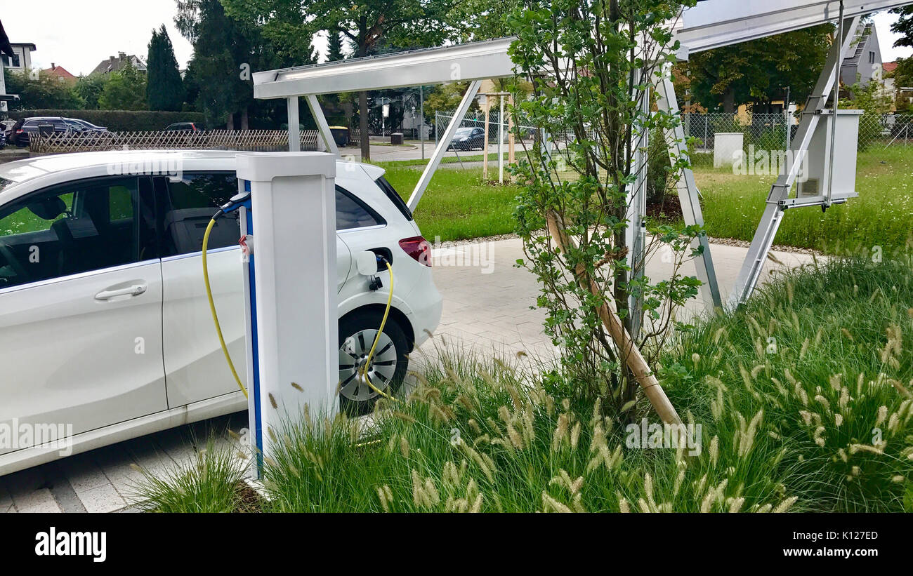 electric car being charged Stock Photo Alamy