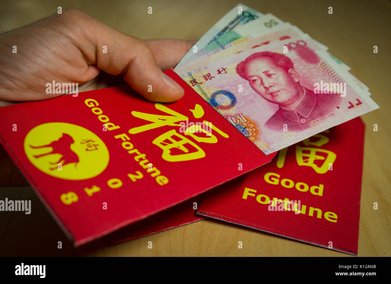 The red envelope or hong bao used for giving money during the