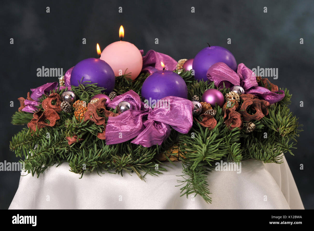 Advent wreath with violet and rose candles 3 Stock Photo Alamy