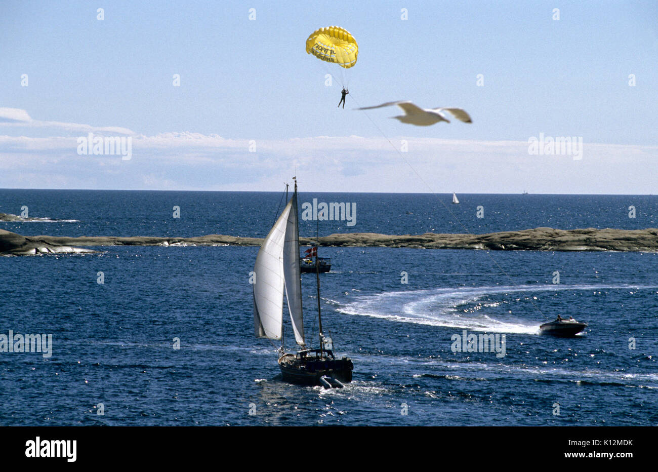Boating in the Bohuslan archipelago 2004 with a paraflyer Stock Photo
