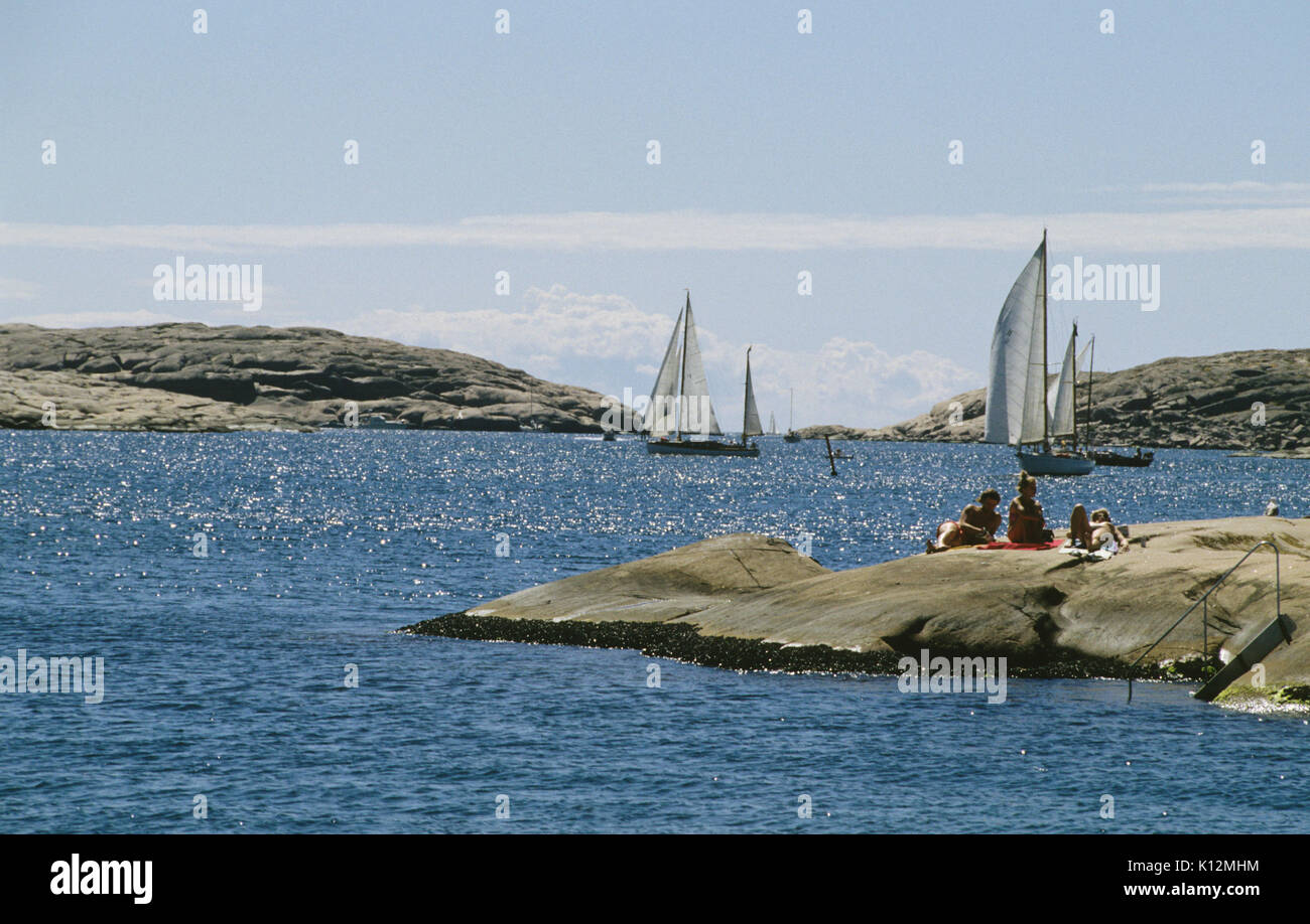 People sunbath on the rocks in the Bohuslan archipelago 2011 Stock Photo