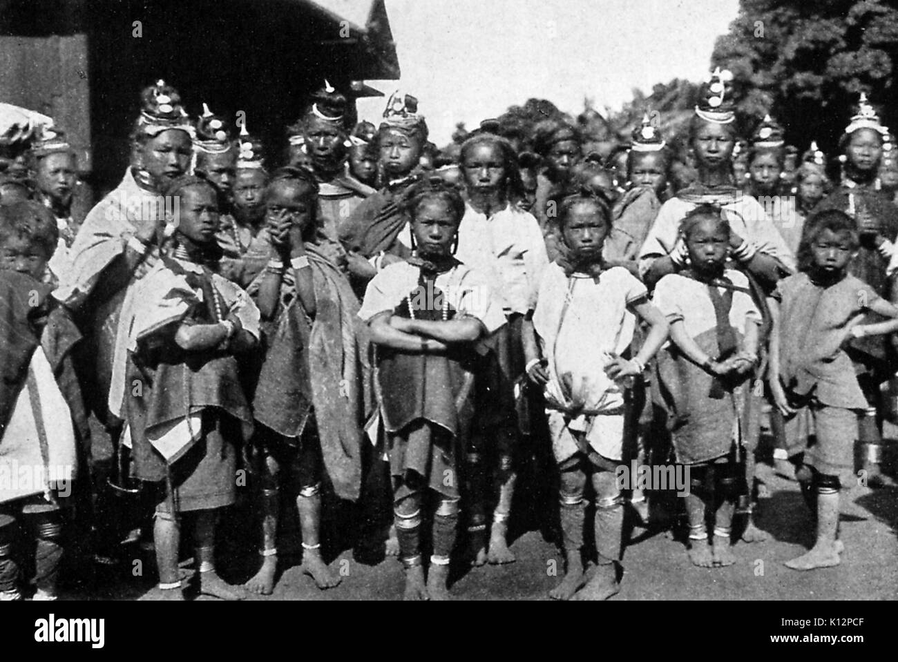Group of padaungs coming to a market arrayed in all their finery, Myanmar (Burma), 1922. Stock Photo
