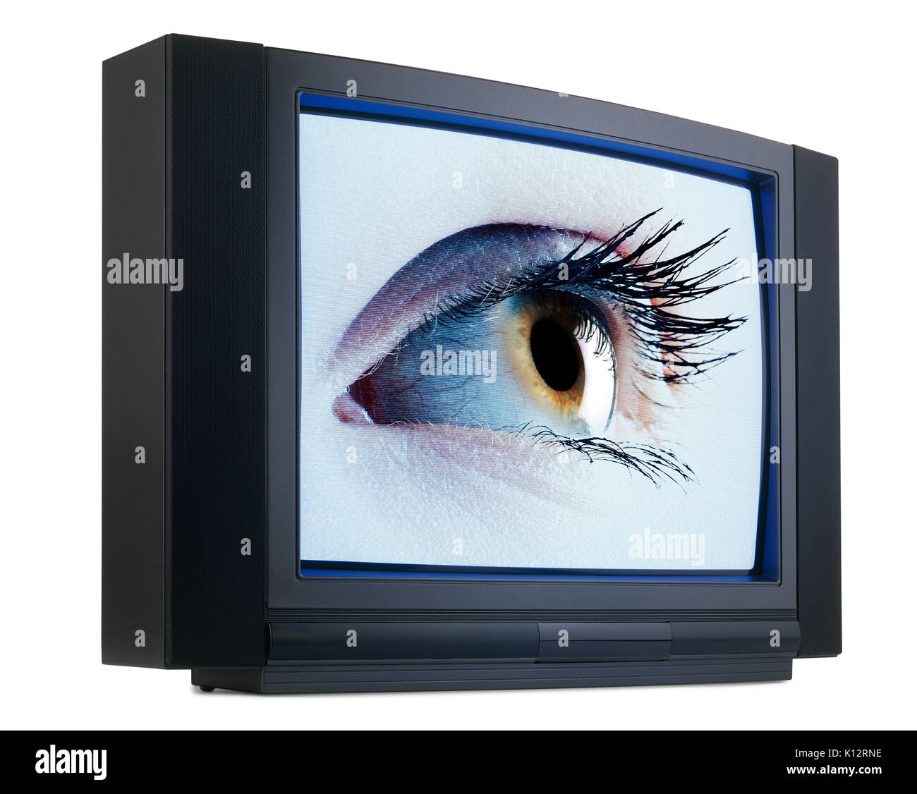 Old fashioned television with green iris eyes isolated on white with clipping path Stock Photo