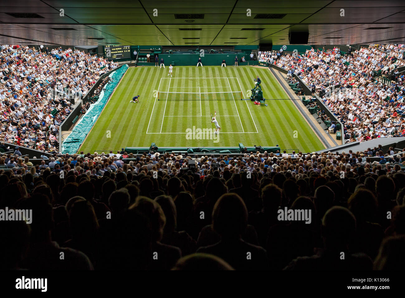 Andy Murray in action against Alexander Bublik at the Gentlemen's Singles 1st Round - Wimbledon Championships 2017 Stock Photo