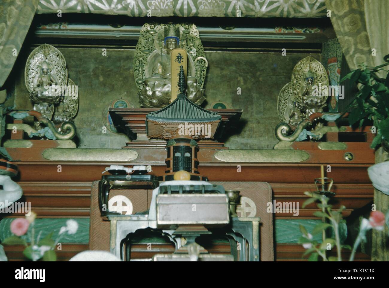 Altar In A Japanese Shrine With Statues A Wooden Pagoda And