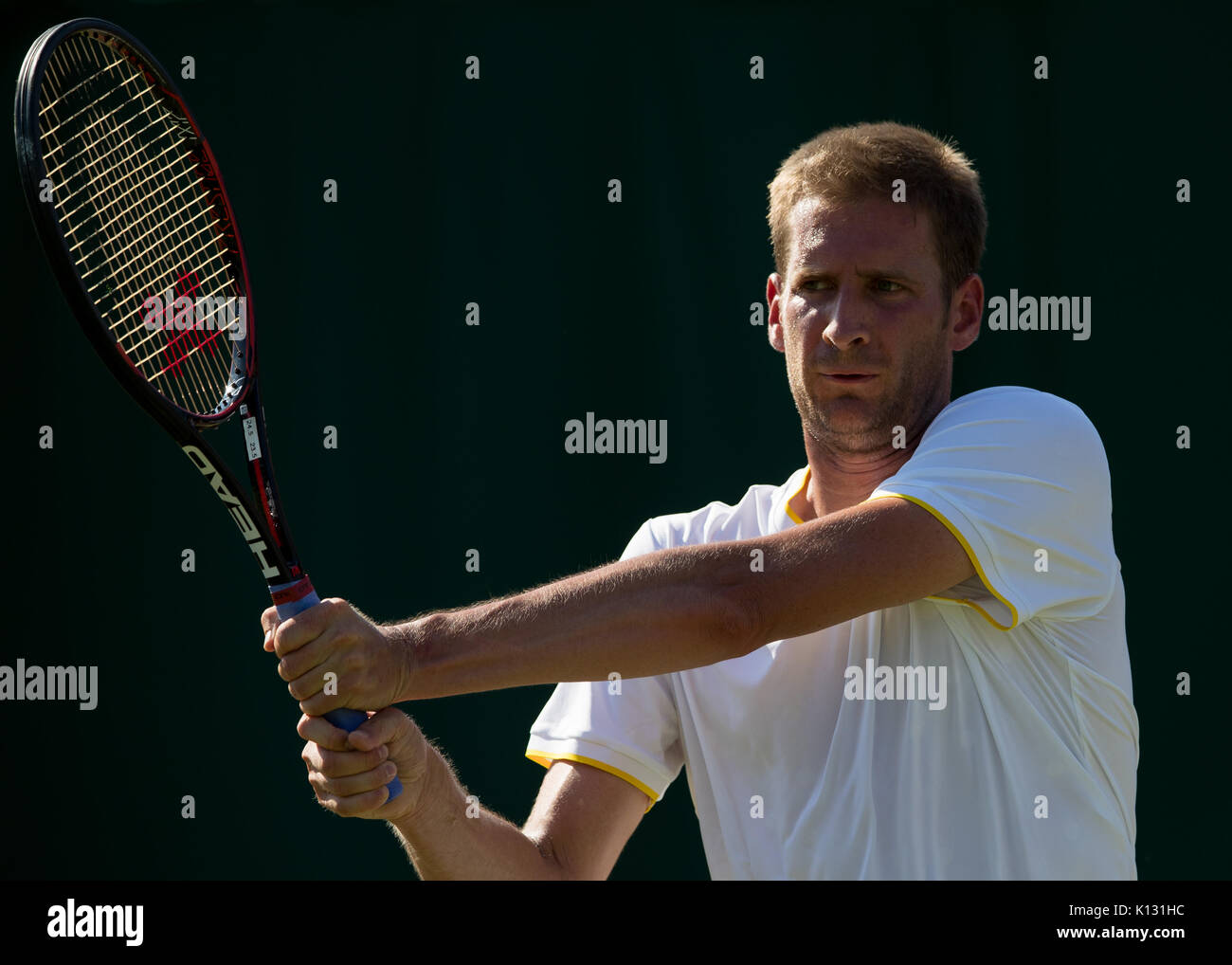 Florian Mayer of Germany in action at the Gentlemen's Singles - Wimbledon Championships 2017 Stock Photo