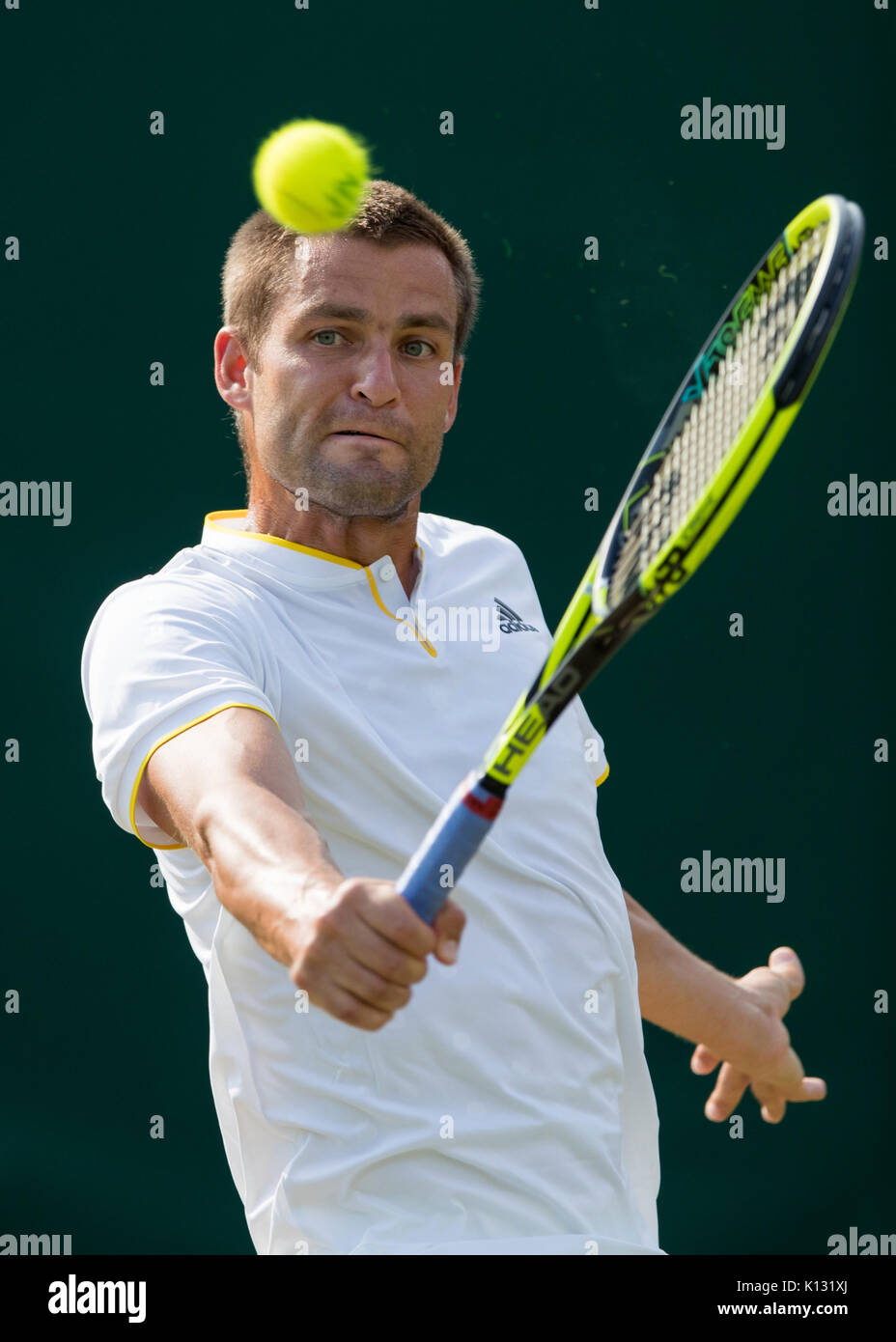 Mikhail Youzhny of Russia in action at the Gentlemen's Singles ...
