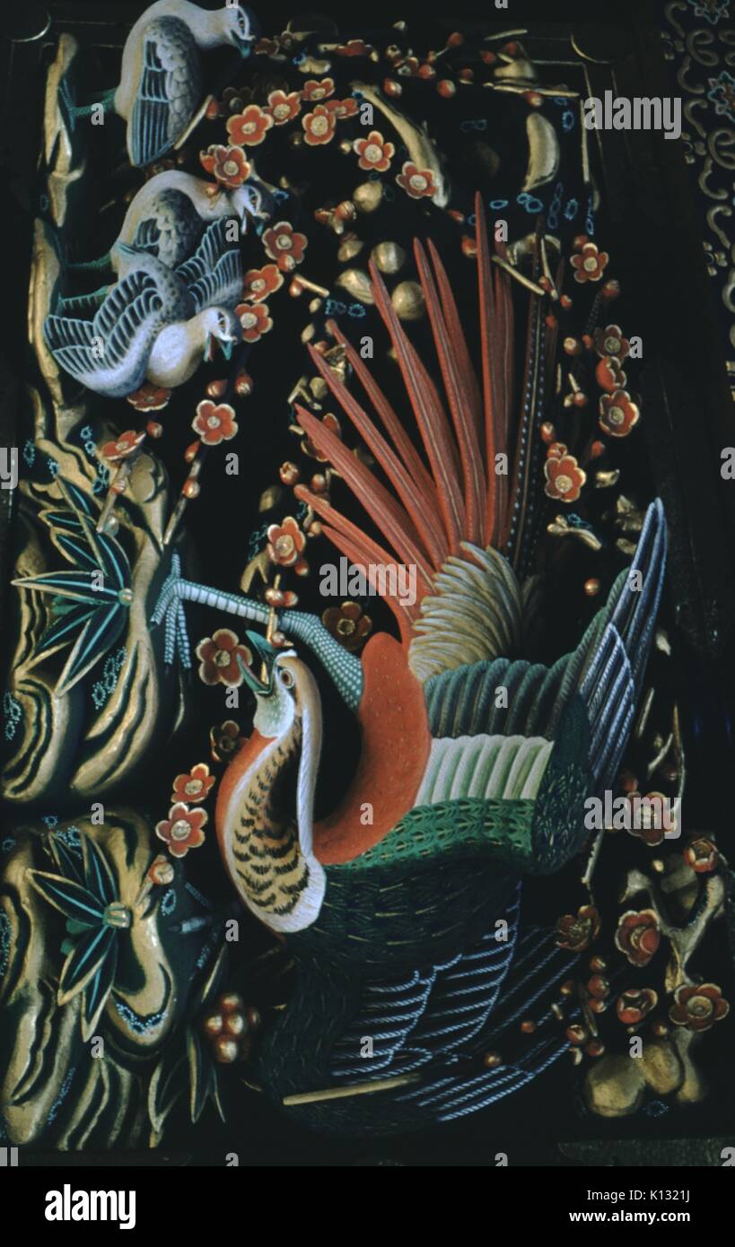 Detail view of lacquered wood painting in a temple, depicting birds and flowers, Japan, 1952. Stock Photo
