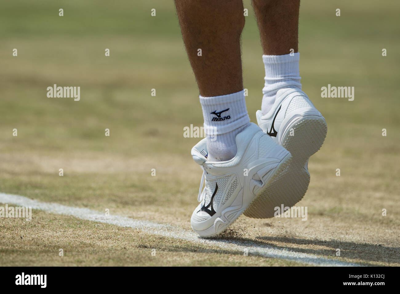 The feet of Marcos Baghdatis of Cyprus at the Gentlemen's Singles - Wimbledon Championships 2017 Stock Photo