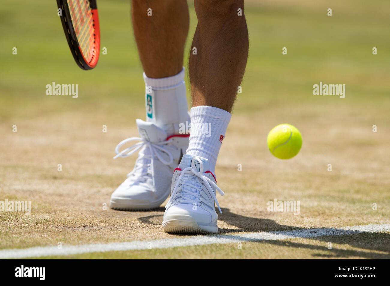 Detail of the shoes of Kei Nishikori of Japan at the Gentlemen's Singles - Wimbledon Championships 2017 Stock Photo