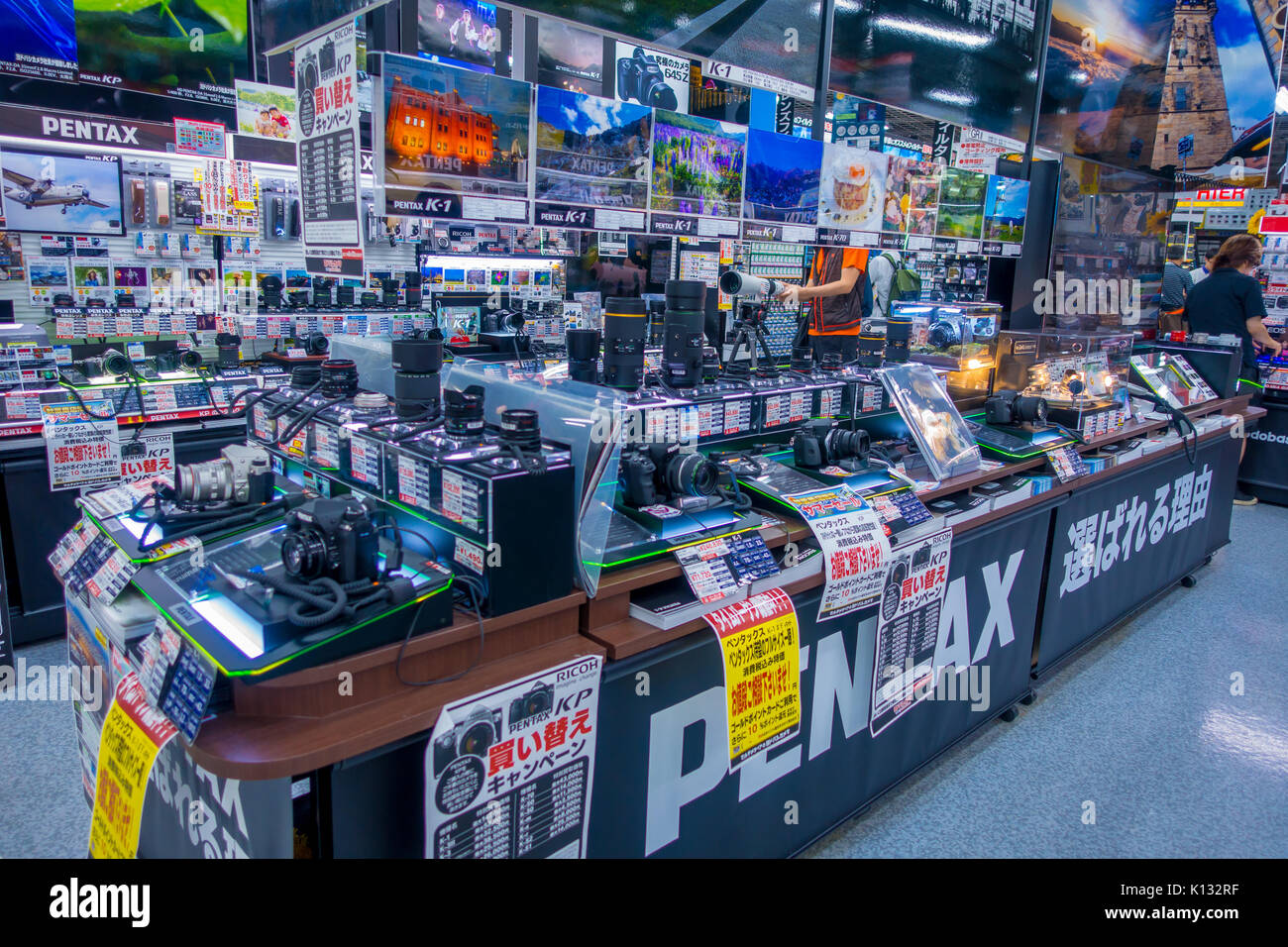 TOKYO, JAPAN JUNE 28 2017 Assorted cameras and lenses inside of Yodobashi camera department