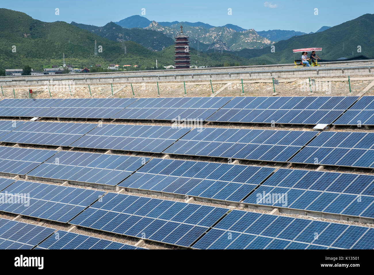 Photovoltaic solar panels on the dam of Yanqi Lake in Huairou, Beijing, China. 24-Aug-2017 Stock Photo