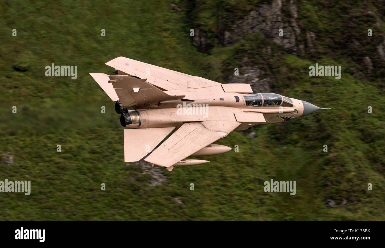 RAF Tornado GR4 on a low level flying sortie in the Mach Loop LFA7 in Operation Granby colour scheme. Hence the aircraft identified as 'Pinky'.  Schem Stock Photo