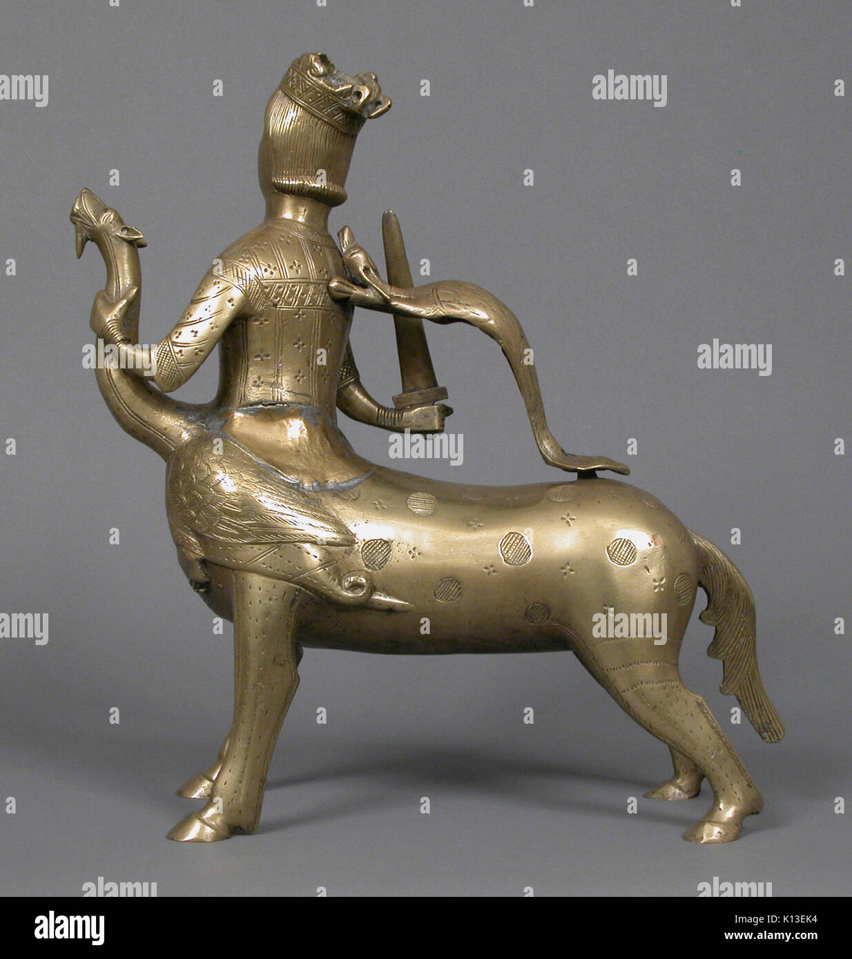 Aquamanile in the Form of a Crowned Centaur Fighting a Dragon MET sf10 37 2s3 Stock Photo