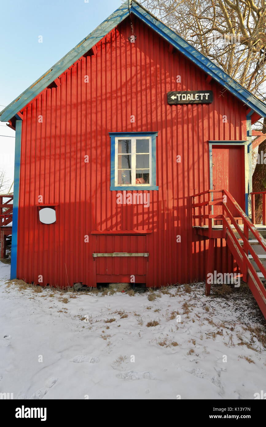 Old vognskja-carriage shed dated 1925 now toalett-toilet building between Torrfiskmuseum-Stockfish Museum and Fiskevaersmuseum-Fishing Village Museum. Stock Photo