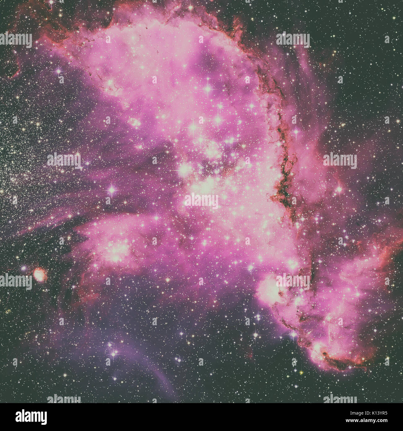 NGC 346 is an open cluster with associated nebula located in the Small ...