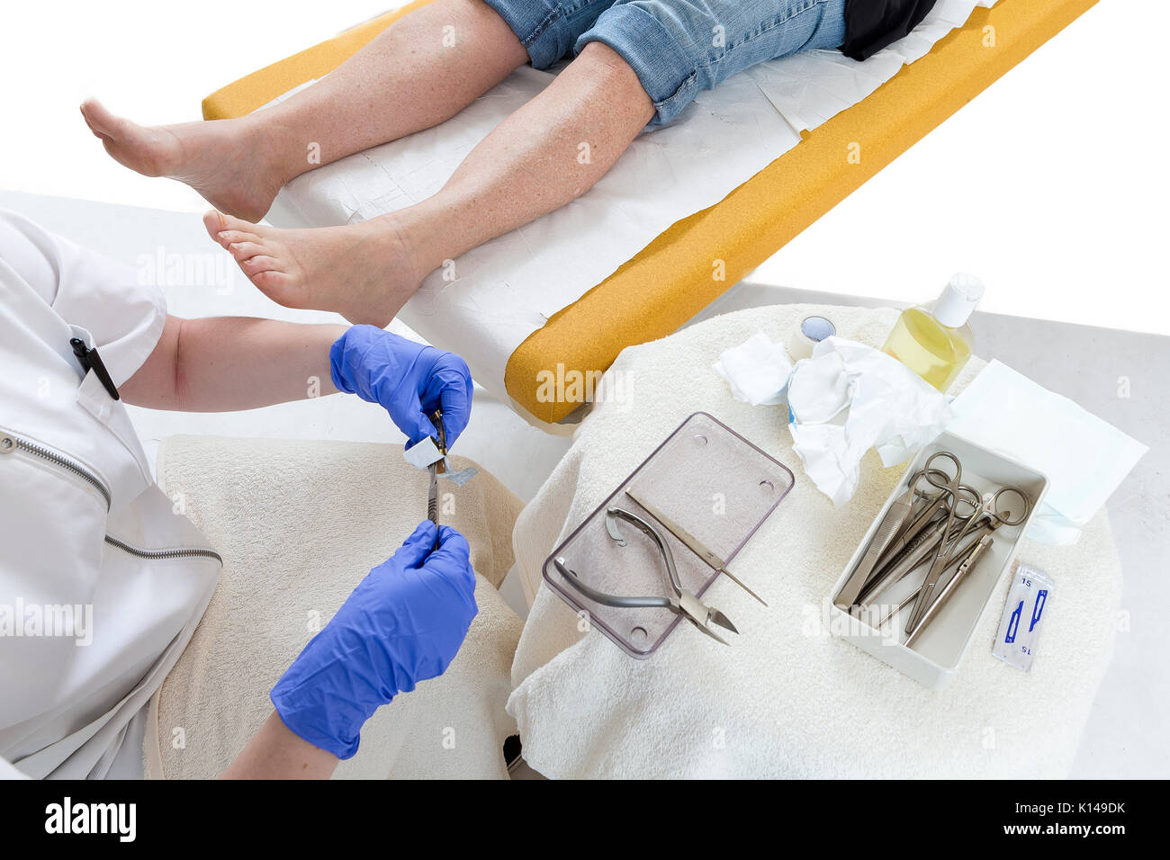 pedicurist cleaning and preparing professional instruments before doing pedicure Stock Photo