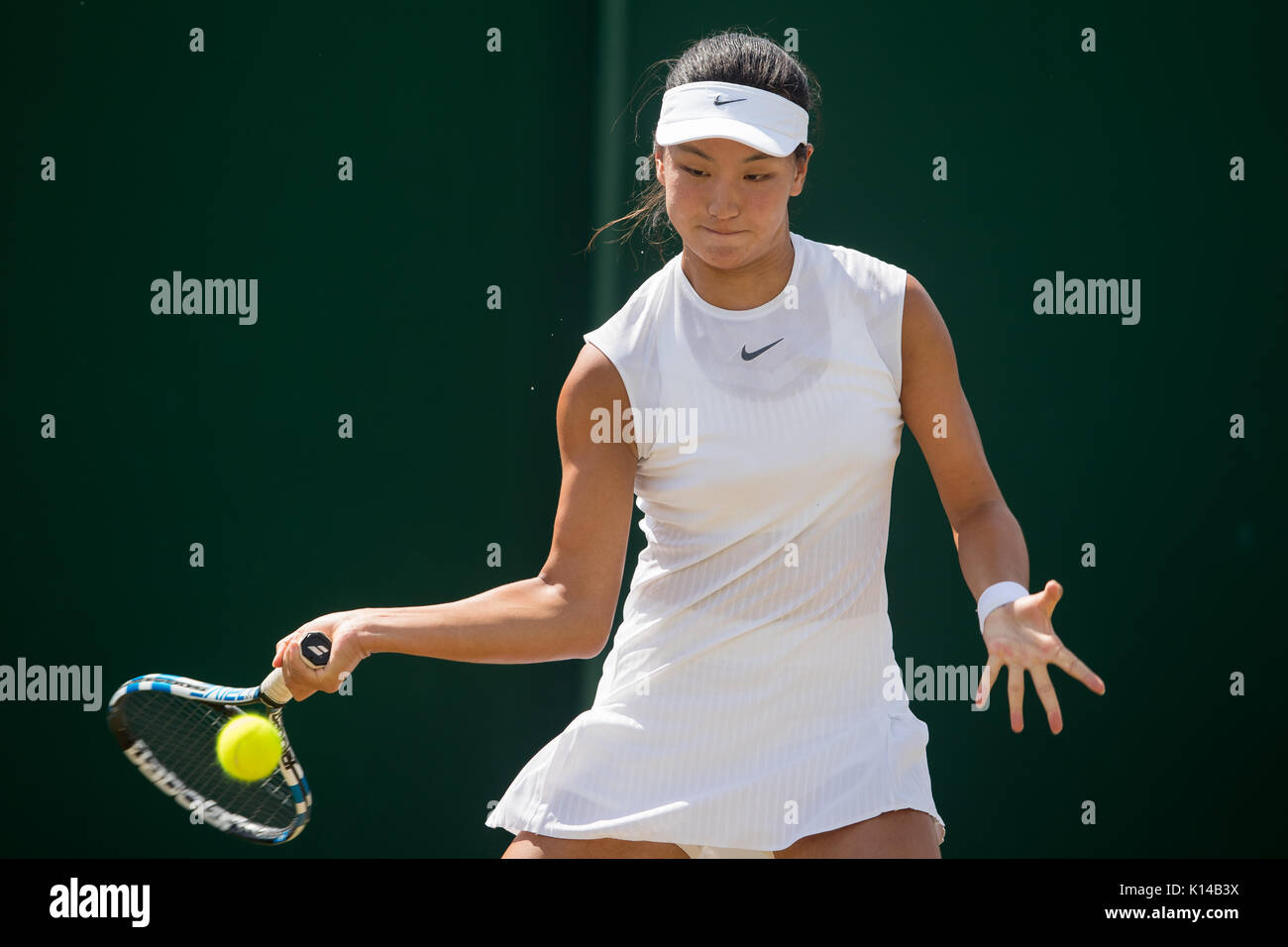 Xin Yu Wang of China at the Girl's Singles - Wimbledon Championships 2017 Stock Photo
