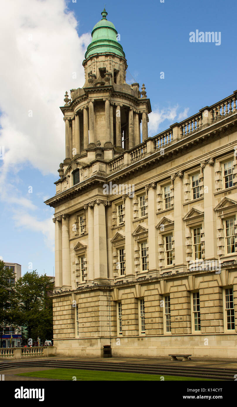 The North east corner of the impressive City Hall in Belfast with its high tower and parapets Stock Photo