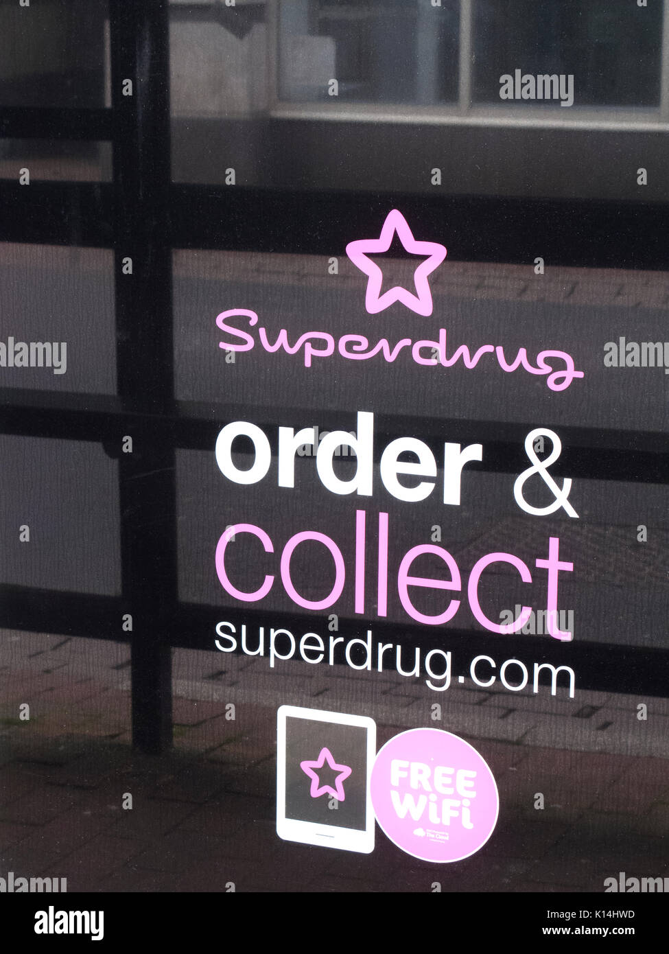 Superdrug store click and collect sign in shop window, United Kingdom based health and beauty